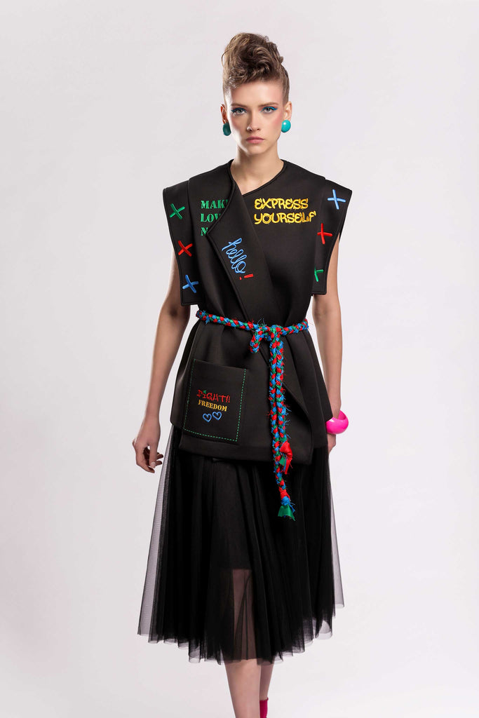 graffiti collection statement piece!  structured cut vest with embroidered statement sentences on the front and the back, featuring an embroidered side pocket and a braided satin belt! Scuba fabric jujule lemonie