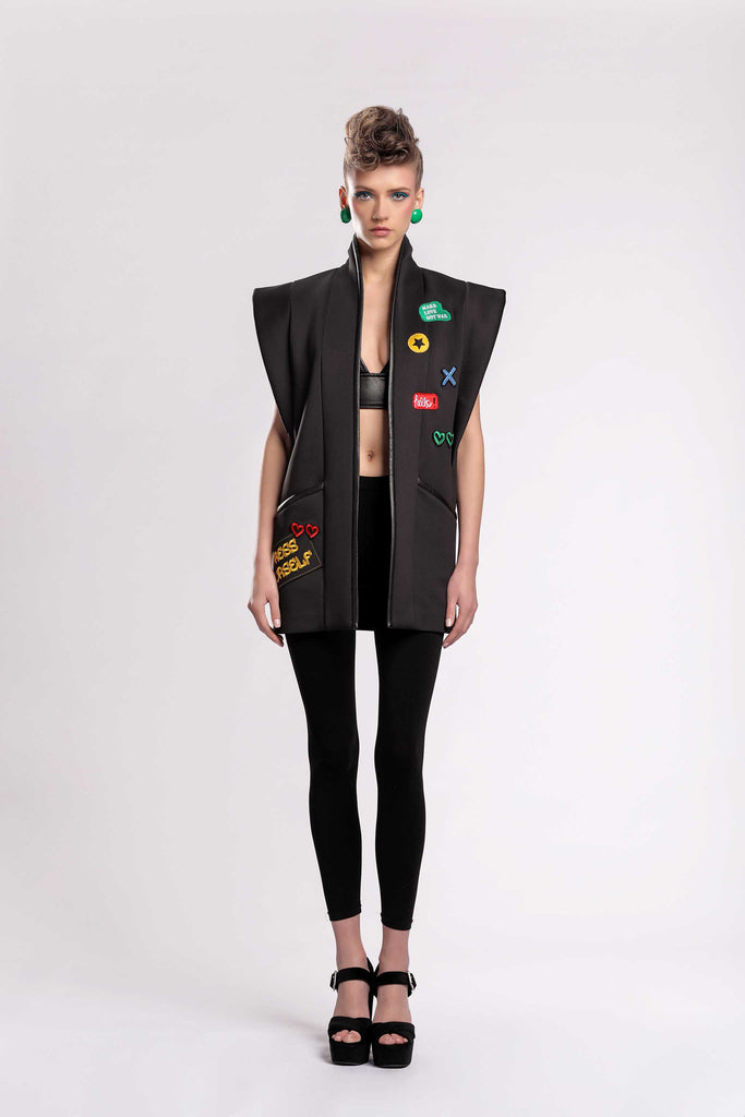 Hera collection striking! Hera Graffiti vest with structured shoulders, faux leather detailing, typographical patchwork, with gold plated belt, made out of scuba material and faux leather jujule lemonie