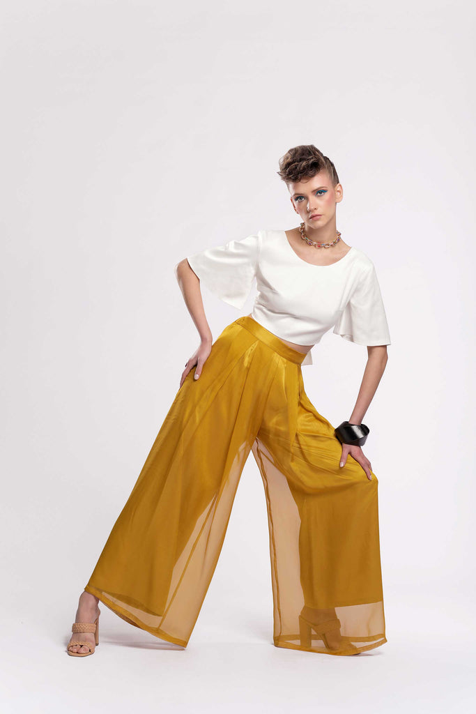  Wide leg trousers Front pleats Elastic waist from the back Concealed zipper fastening Fully lined Fabric: Satin Chiffon jujule lemonie yellow